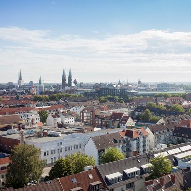 Arbeitsbedingungen in Deutschland Blick über die Dächer Bremens